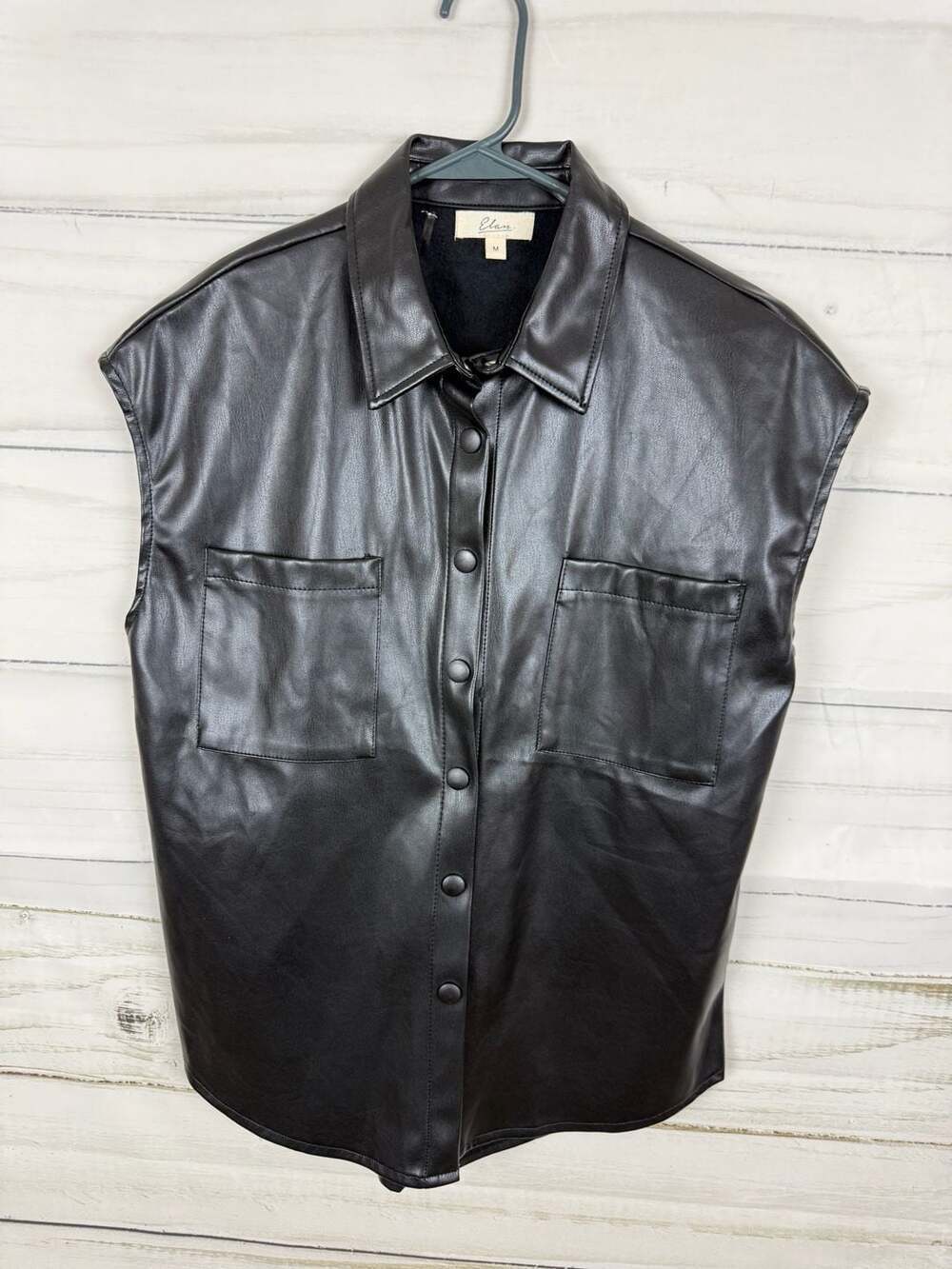 Elan Faux Leather Sleeveless Button Down Vest Jacket in Black